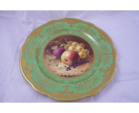 A coalport china cabinet plate with central hand painted still life scene depicting apple, plum, grapes and blackcurrants on 