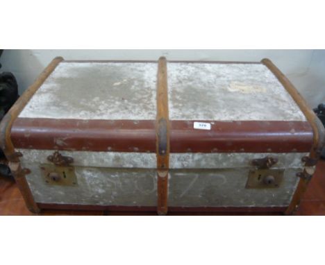 A bamboo bound travelling trunk with brass corners