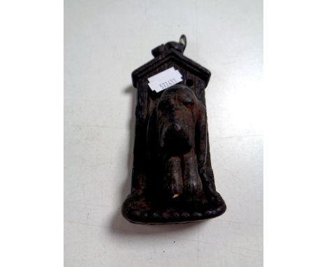 A Victorian cast iron dog's head door knocker 