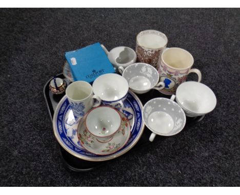 A tray containing assorted ceramics to include a 19th century hand painted tea bowl with saucer, a Royal Crown Derby Imari pa