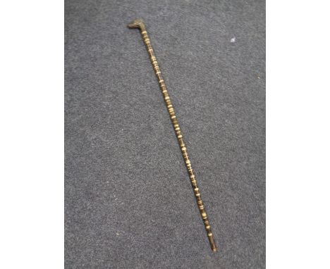 A vintage banded horn walking stick with brass dog's head handle 