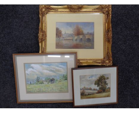 A K. Baggaley watercolour, bridge over a river, framed, together with two further watercolours   