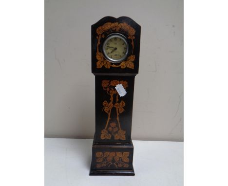 A 19th century pocket watch stand in the form of a grandfather clock together with a Smith's Empire pocket watch  