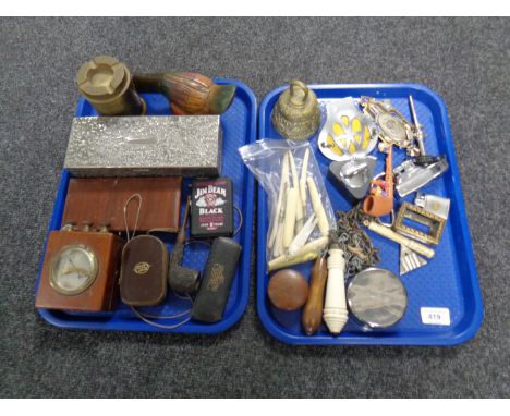 A box of collectables including an antique corkscrew, AA badge, table lighter in the form of a boat, antique spectacles etc. 