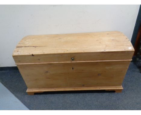 An antique pine dome topped trunk 