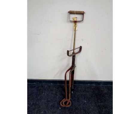 Two vintage stirrup pumps  