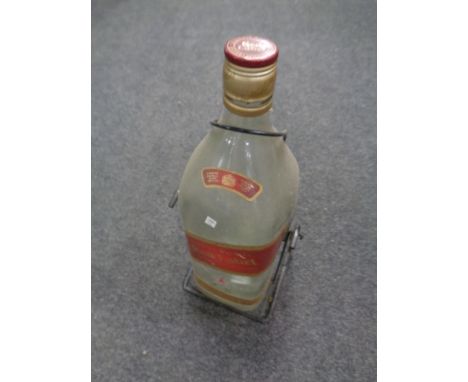 A 4.5 litre Johnnie Walker Red Label Scotch Whisky bottle on decanting stand (empty) 