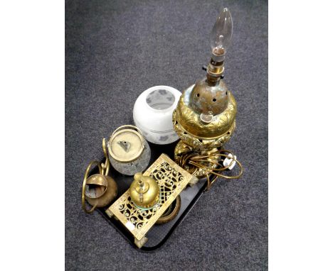 A tray containing a 19th century brass embossed oil lamp base (converted to electric) with glass shade together with a brass 