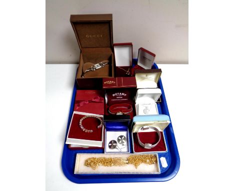 A tray containing assorted costume jewellery, silver pendant on chain, Celtic earrings, lady's wristwatches to include Rotary