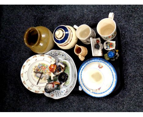 A tray containing assorted ceramics to include commemorative trio, Goss pieces, a Torquay ware lidded pot, continental figuri
