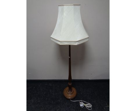 A beech standard lamp with shade 