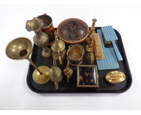 A tray containing assorted brass and copper ware, Ronson table lighter, three piece dressing table brush set 