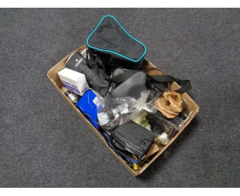 A box containing a large quantity of camera equipment to include cameras, tripods, lenses, a P. P. G. universal light etc 