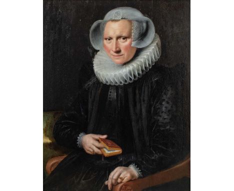 Circle of Paulus Moreelse (1571-1638) DutchPortrait of a lady, seated in a chair wearing a white ruff and black silk attire, 