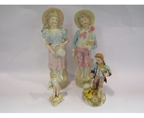 Four Continental ceramic figures including girl with watering can, a/f 