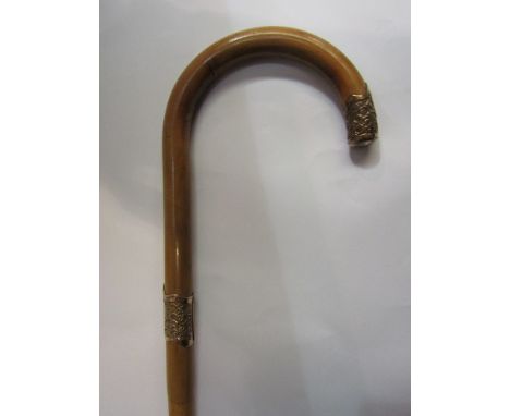 An 18ct gold collared walking stick