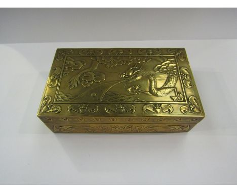 A Chinese brass trinket pot decorated with dragon   
