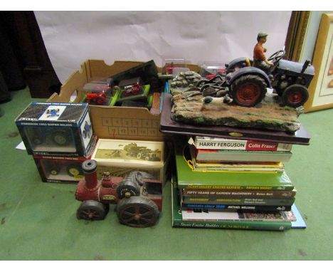 Two boxes of tractor models and related books