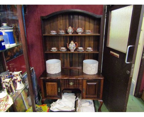 A Queen Anne style hardwood dresser, plate rack above two door single drawer base, 185cm x 113cm x 46cm