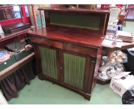 A Circa 1800 mahogany chiffonier the three quarter pierced brass gallery and raised shelf on reeded brass supports over two f