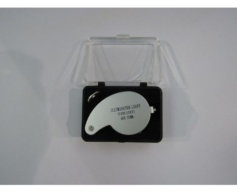 A 40x pocket magnifier/ jeweller's loupe with LED light