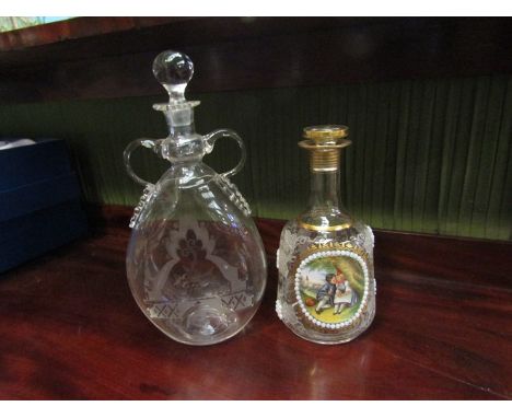 Two Victorian continental decanters, one with hand painted enamel plaque 