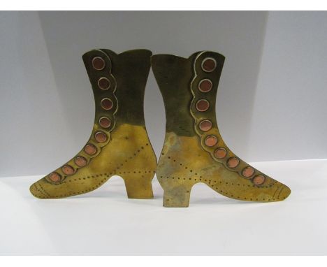 Two pairs of brass ornamental mantelpiece boots 