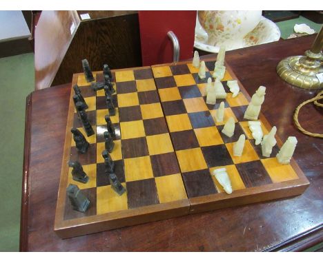 A chess board and chess pieces a/f