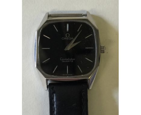 GENTS OMEGA CONSTELLATION - quartz watch with black dial and baton hour markers. Stainless steel case. Needs new battery - ho