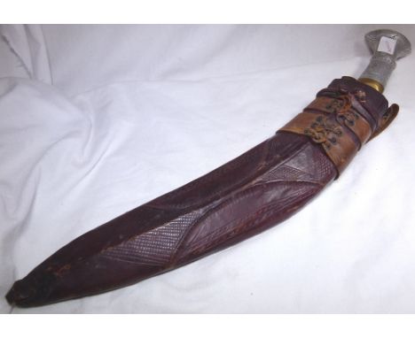 NEPALESE KUKRI. White metal handled Nepalese kukri with original skinning knives and leather scabbard. L: 50 cm