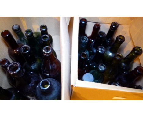 VINTAGE ENGLISH AND WELSH BOTTLES. Two boxes of brown and green bottles from the north west of England and north Wales.