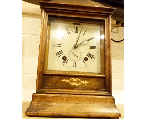 CHIMING BRACKET CLOCK. Inlaid Oak cased bell chiming bracket clock with secondary seconds dial A/F 