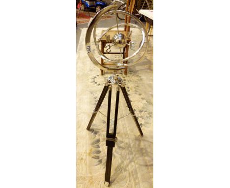 METAL ARMILLARY. Metal armillary on wooden tripod stand, H: 108 cm