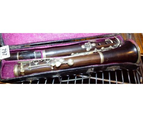 ANTIQUE CLARINET.  Cased antique clarinet, mouthpiece marked Gaubert A. Lille