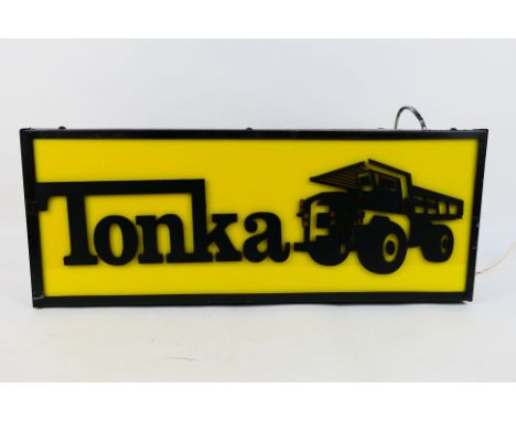 Light Box - A custom made metal framed Tonka themed light box measuring 67 x 27 x 10 cm. No plug fitted. (This does not const