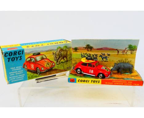 Corgi - A boxed East African Safari Volkswagen Beetle 1200 # 256. The car appears in Very good condition with minor paint wea
