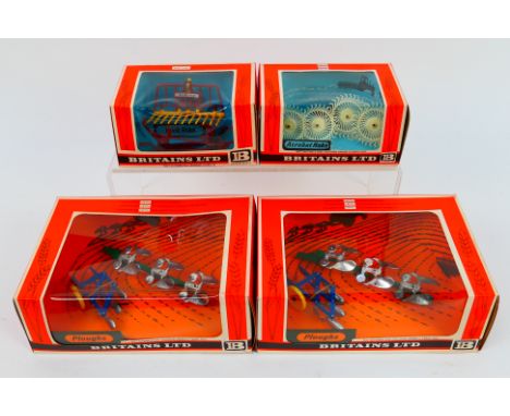 Britains - Four boxed Britains farm implements. Lot consists of Britains #9537 Acrobat Raker; #9543 Buck Rake; plus #9546 Plo