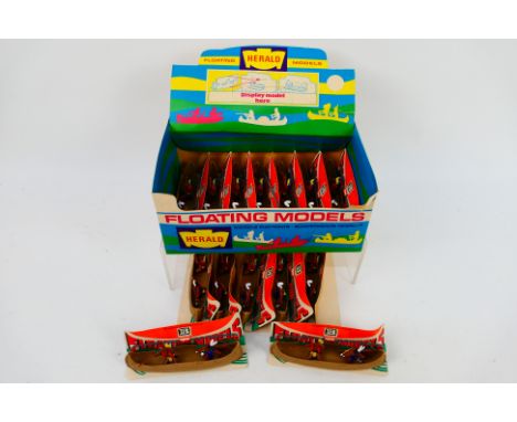 Britains Herald Series - A Herald 'Floating Model' series Shop Counter pack containing 14 carded #4501 Indian Canoe. The indi