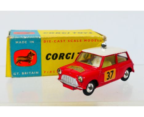 Corgi - A boxed Monte Carlo B.M.C. Mini Cooper S # 317. The car appears in Very Good condition with some paint wear on raised
