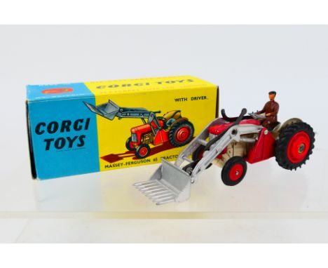 Corgi - A boxed Massey Ferguson 65 tractor with fork # 57. The tractor appears in Very Good condition with just a few small m