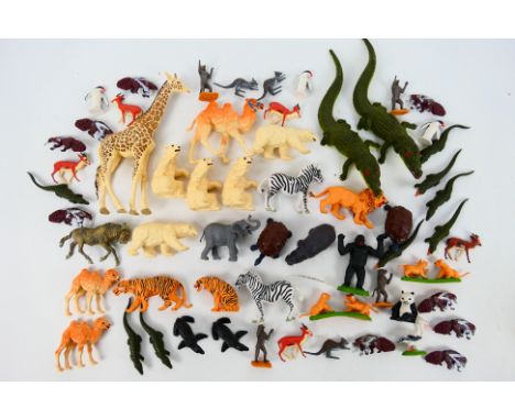 Britains - A loose collection of 60 Britains plastic Zoo / Safari Park animals. Lot includes #1350 Giraffe with articulated n