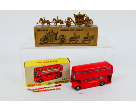 Dinky - Britains - A boxed Dinky Routemaster Bus # 289 and a boxed Britains Miniature Coronation Coach # 1478. The models app