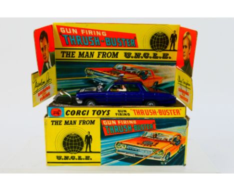 Corgi - A boxed The Man From Uncle Thrush-Buster Oldsmobile # 497. The car appears Near Mint with only a few minor marks, thi
