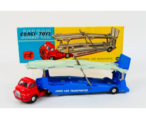 Corgi - A boxed Bedford Carrimore Car Transporter # 1101. The model appears in Very good condition with only light wear. The 