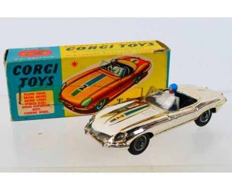 Corgi - A boxed Jaguar E Type Competition model in chrome finish # 312. The car appears in Good condition with some light wea