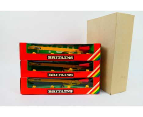 Britains - A trade pack containing a trio of Britains #9579 Elevator. The models appear to be in Mint condition, in Very Near
