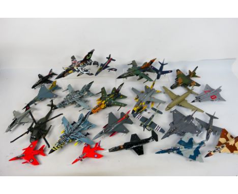 24 built model military aircraft plastic kits in various scales from numerous manufacturers. The models include Mirage F.1C; 