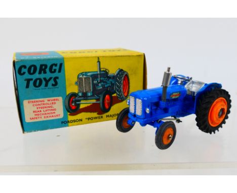 Corgi - A boxed Fordson Power Major tractor with dull orange wheels # 55. The tractor appears Near Mint with only some minor 