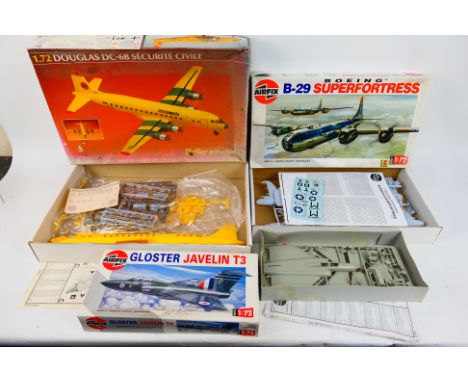 Airfix - Heller - Three boxed 1:72 scale plastic model aircraft kits. Lot comprises Heller #80316 Douglas DC-6B Securite Civi