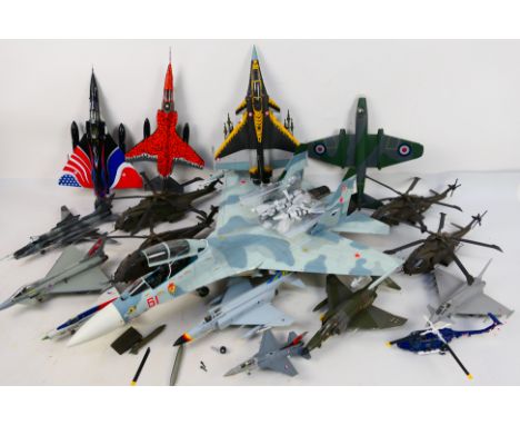 17 built model military aircraft plastic kits in various scales from numerous manufacturers. The models include a very large 